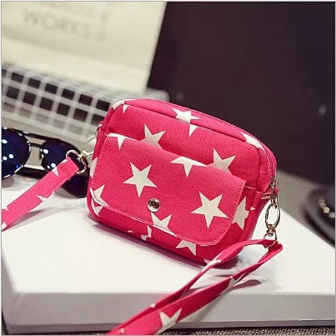 Multi Starrer Movie Night Wristlet And Cross Body Bag